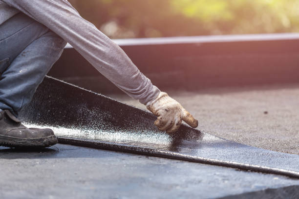 Professional Emergency Waterproofing technician working in Lawrence, MI